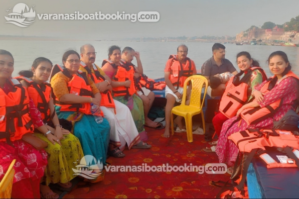 Group of passengers on a private boat ride in Varanasi